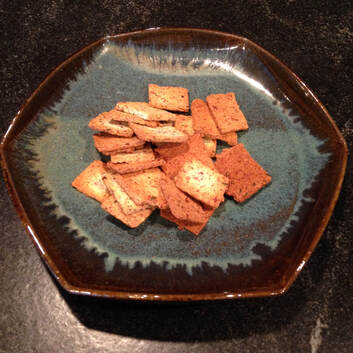 Almond crackers in a plate made by Willi Singleton.