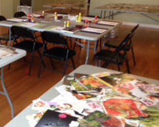 A SoulCollage® workshop showing tables of images and seating.